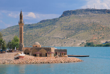 Sanliurfa, Halfeti, blue lake and green trees, hidden paradise, old houses and mosque
