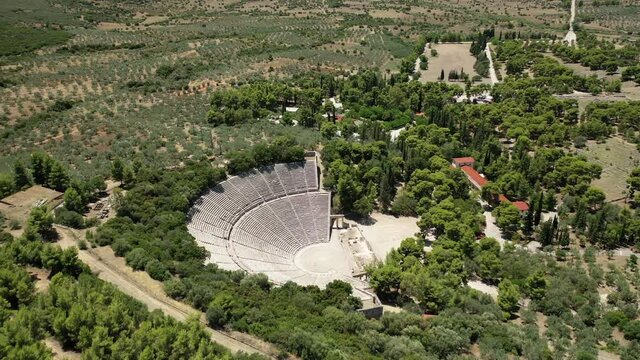 Aerial drone video of massive ancient theatre of Epidaurus or Epidavros, Argolida, Peloponnese, Greece