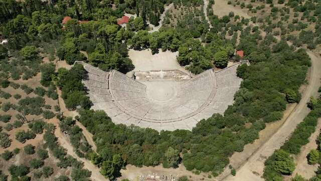 Aerial drone video of massive ancient theatre of Epidaurus or Epidavros, Argolida, Peloponnese, Greece