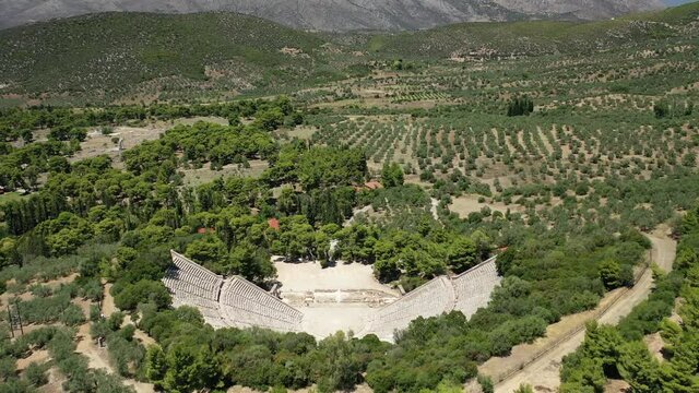 Aerial drone video of massive ancient theatre of Epidaurus or Epidavros, Argolida, Peloponnese, Greece