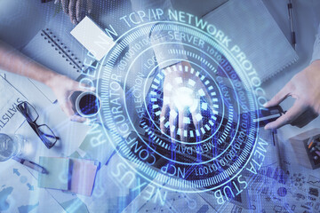 Double exposure of man and woman working together and data theme hologram drawing. Computer background. Top View.