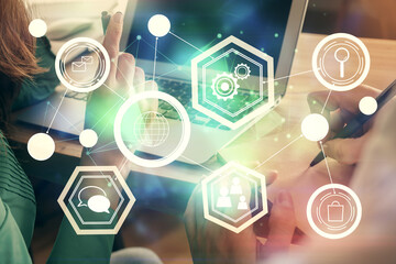 Double exposure of man and woman working together and social network theme hologram drawing. People connection concept. Computer background.