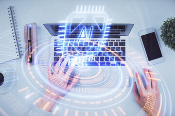 Double exposure of woman hands working on computer and data theme hologram drawing. Top View. Technology concept.