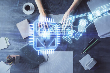 Double exposure of woman hands working on computer and data theme hologram drawing. Top View. Technology concept.