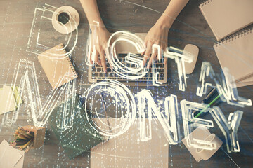 Double exposure of woman hands working on computer and blockchain theme hologram drawing. Top View. bitcoin cryptocurrency concept.