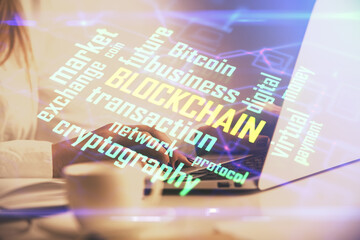 Obraz premium Double exposure of woman hands typing on computer and crypto market theme hologram drawing. Blockchain concept.