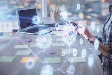 Multi exposure of woman hands working on computer and data theme hologram drawing. Tech concept.
