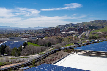 Light clouds over urban landscape of Salt Lake City