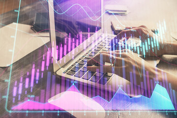 Double exposure of woman hands typing on computer and forex chart hologram drawing. Stock market invest concept.