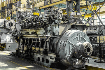 Diesel locomotive engine in a repair depot room