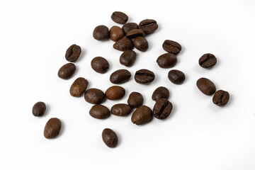 Coffee beans isolated on white background. Brown aromatic arabica