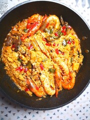 davCloseup of a paella a Spanish Mediterranean rice dish originally from Valencia_vivi