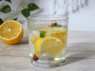 Glass of lemonade with lemon