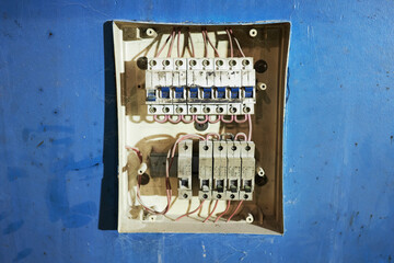 old and dusty electrical switch panel. damaged wires at switchers need to replace. fire safety...