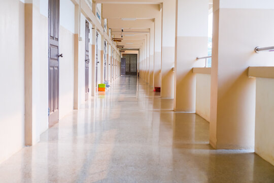 High School hallway corridor in College or university empty hall at classroom, no people student while closed quarantine in situation of Covid-19 disease outbreak result in inability organize learning