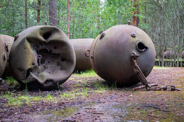 Old soviet underwater naval mines casings scattered in the forest of Naissaar island, Estonia
