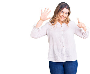 Young caucasian woman wearing casual clothes showing and pointing up with fingers number six while smiling confident and happy.