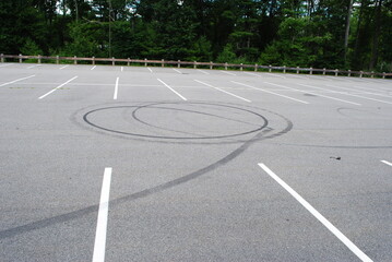 Tire burnout loop de loop in parking lot