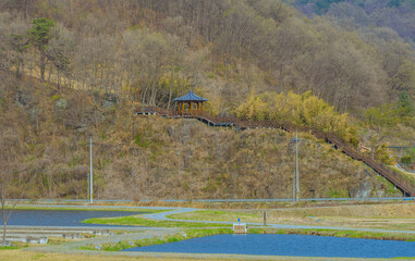 Oriental gazebo on side of mountain