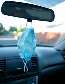 The New Normal - Face Mask Hanging From Rear View Mirror