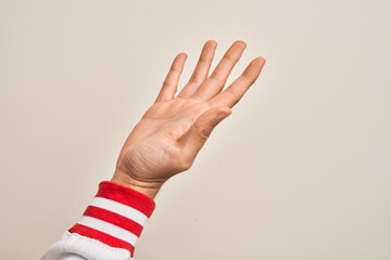 Hand of caucasian young man showing fingers over isolated white background presenting with open...