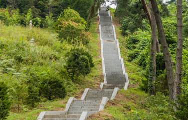 Concrete stairway up a mountainside