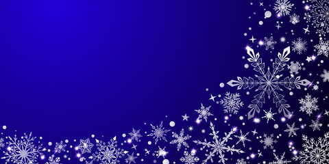 Christmas background with various complex big and small snowflakes, white on blue