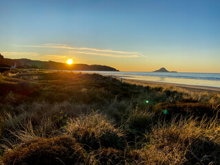 Ohope beach near Whakatane at sunset in New zealand