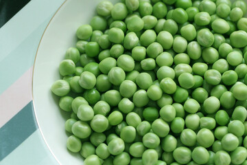 fresh green peas in a plate