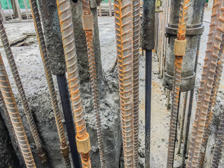 Deformed steel bar was connected in the reinforce cement column by the jacket connector in the...