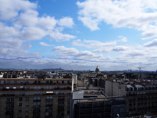 Celebrating Bastille Day Air Force and Army demonstration flight in Paris sky.
