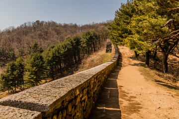 Dirt path behind top of fortress wall