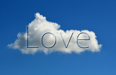 Single lone cloud floats in blue sky with the word love.