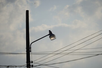 Obraz premium electricity, sky, power, pole, cable, line, wire, blue, electric, energy, wires, lines, electrical, post, voltage, pylon, telephone, industry, high, light, bird, tower, supply, nature, technology