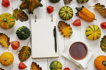 Thanksgiving holiday. autumn to-do list. Autumn  Mock up.Blank notebook, white cup with tea, a set...