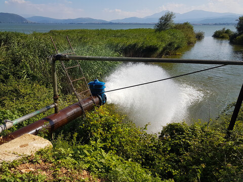 water flowing from pipe water waste in ioannina lake