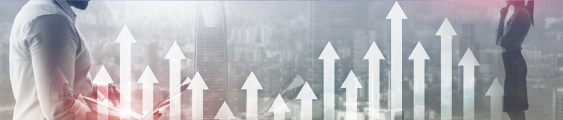 Financial growth concept. Up arrows on modern night city. Panoramic business background.