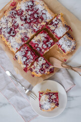 Obraz na płótnie Canvas sweet home made raspberry cake with almonds