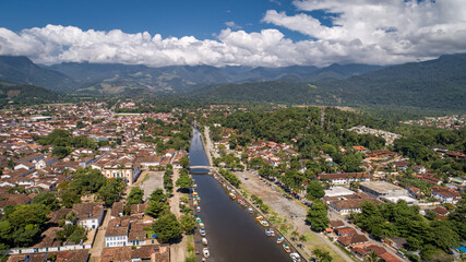 Aerial view to historic town Paraty and river Pereque-Acu with green mountains in background, Brazil, Unesco World Heritage