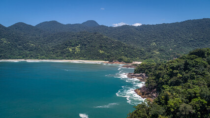 Aerial view to wonderful Green Coast bay and mountains covered with Atlantic Forest, Picinguaba, Brazil
