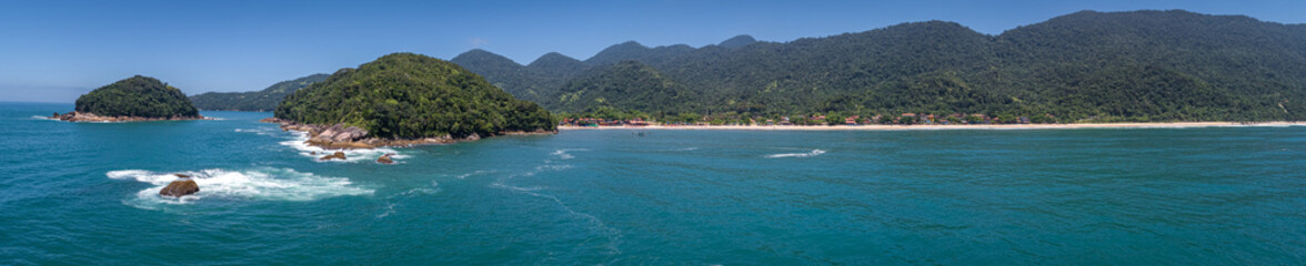 Fototapeta premium Aerial view panorama of wonderful Green Coast shoreline with islands, bays and mountains covered with Atlantic Forest, Picinguaba, Brazil 
