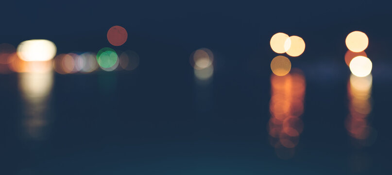 Simple dark banner with moody boken lights