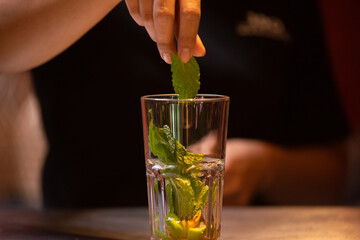 Lemon soda. Beverage for summer with waiter.