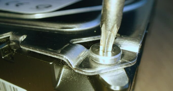 Torx screw being undone fixing computer