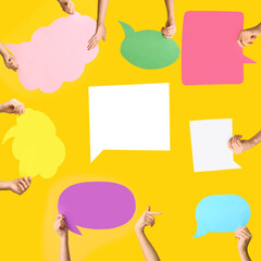 Many female hands with blank speech bubbles on color background