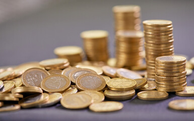 Stock Photo - Euro coins. Euro money. Euro currency.Coins stacked on each other in different positions. Money concept