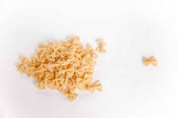 Pasta on a white background. bow. Variety of types and shapes of Italian pasta.