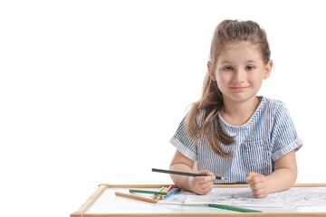 Cute little girl coloring pictures on white background