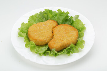 chicken nuggets on a white plate white background