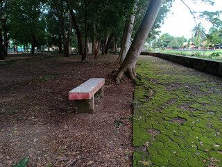 brick sitting chairs in a city park
